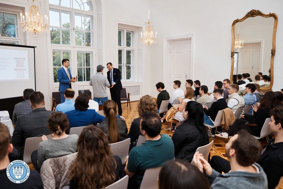 Students listening toMag. Berthold Baurek-Karlic, founder and managing director of Venionaire Capital