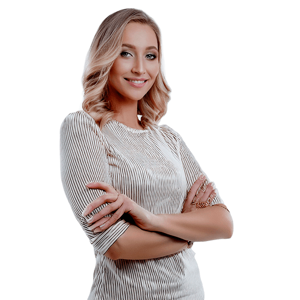 Woman smiling and posing to the camera.
