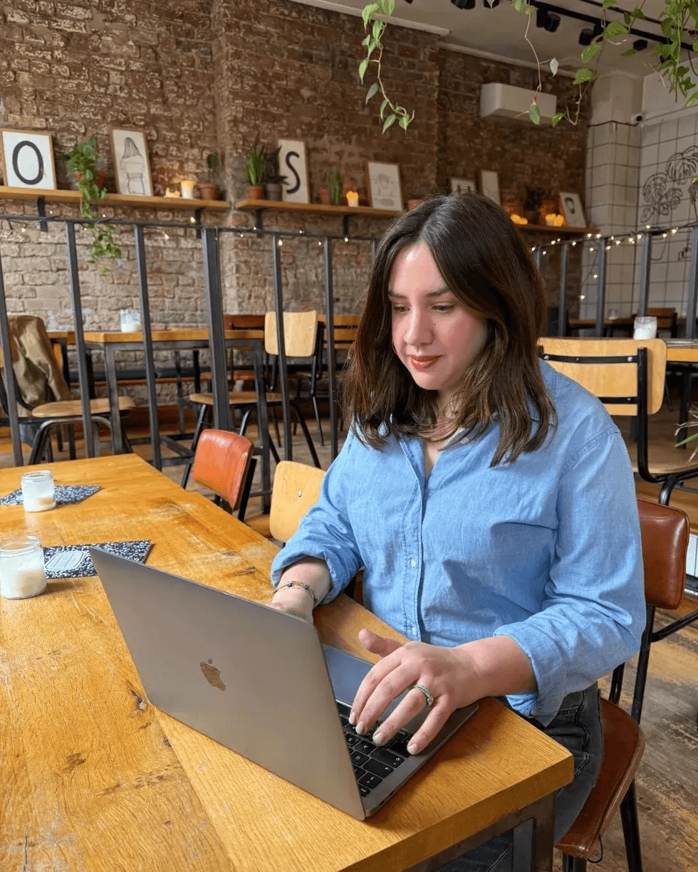 Catherine working at laptop
