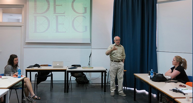 man teaching at school