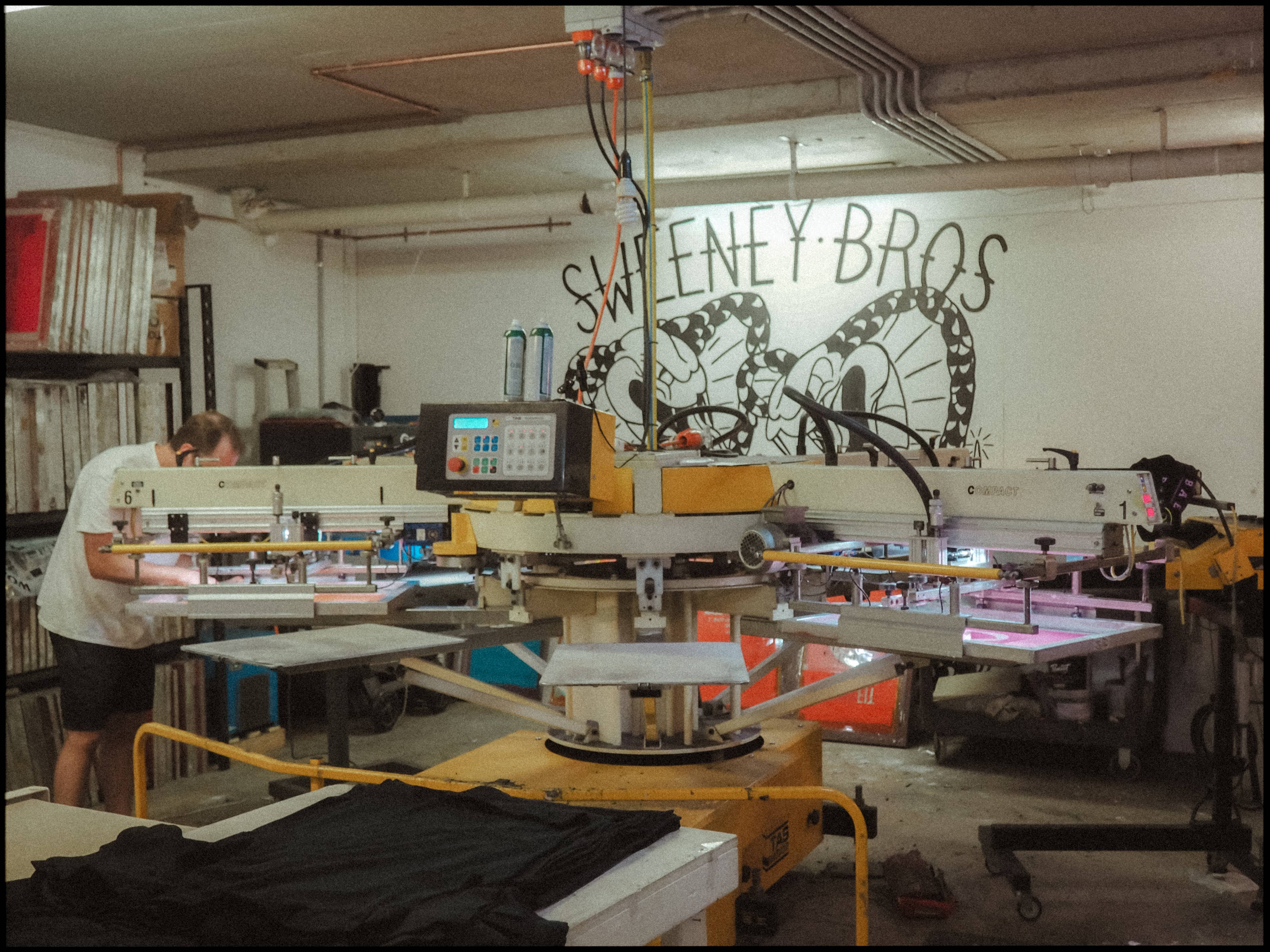 Man with camera sitting on bench