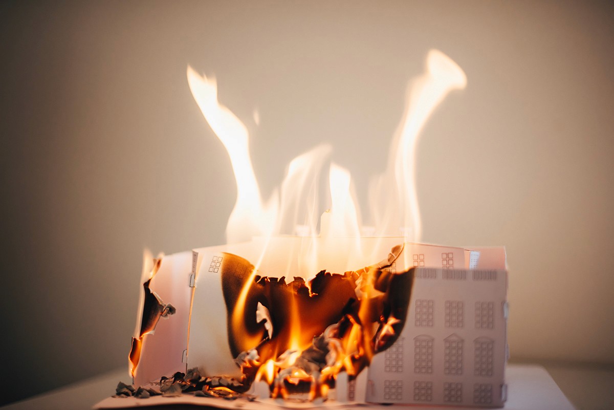 a woman holding an apple