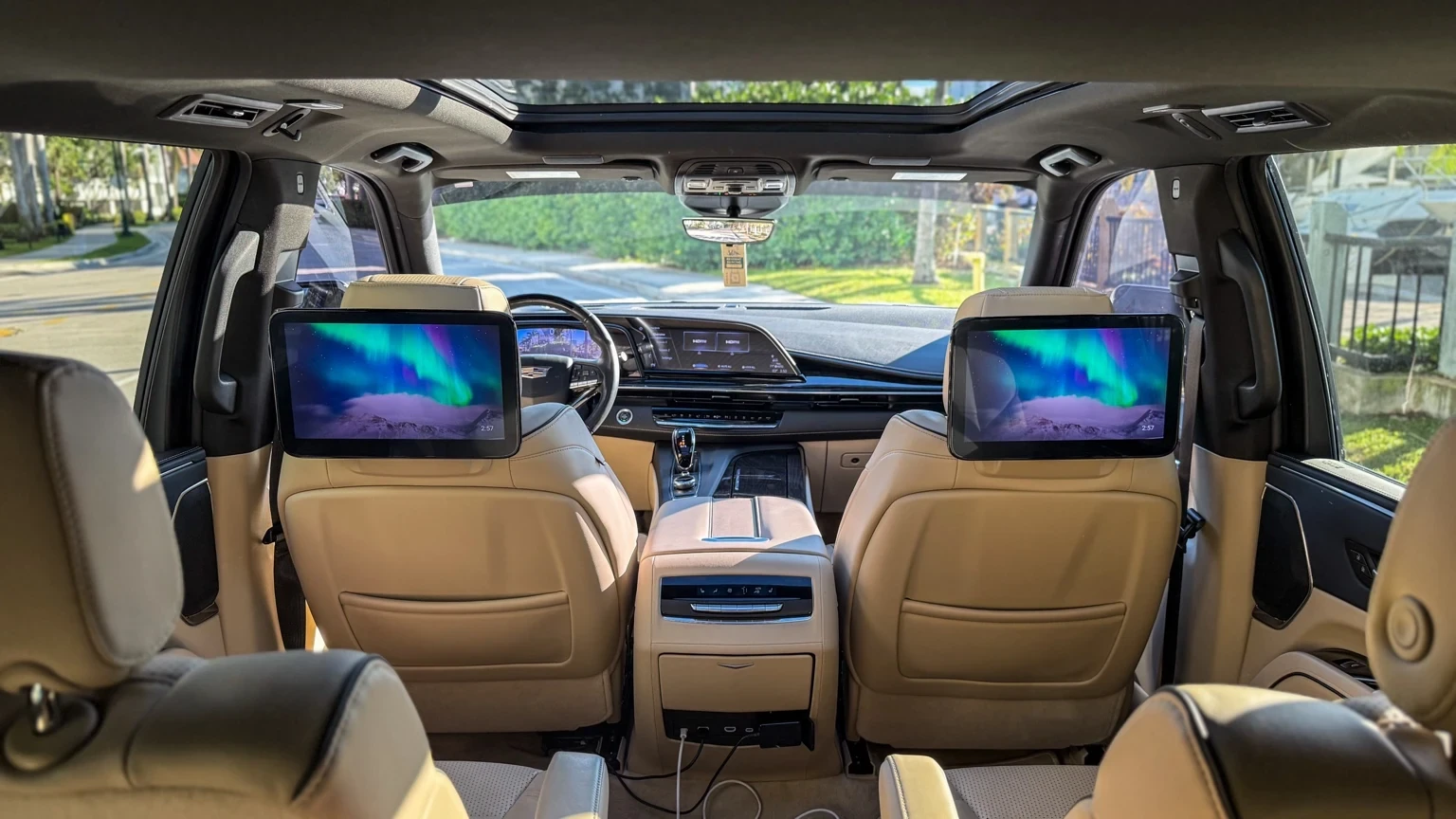 Cadillac Escalade ESV rear passenger view with entertainment displays