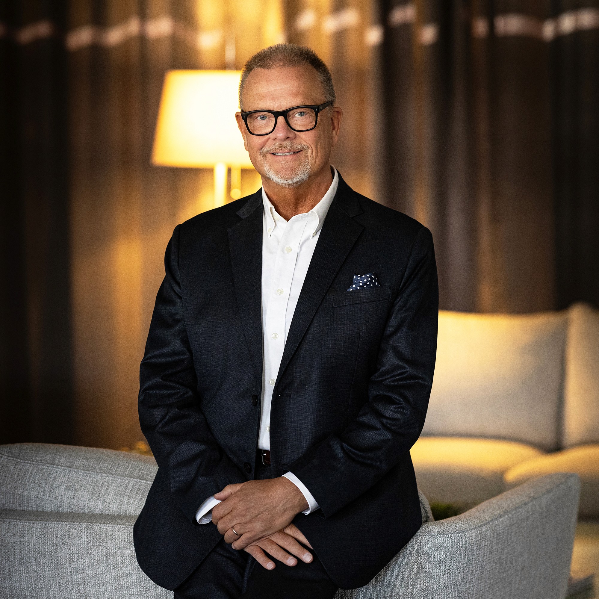 Portrait of John Doe Anderson, CEO of Omnis.