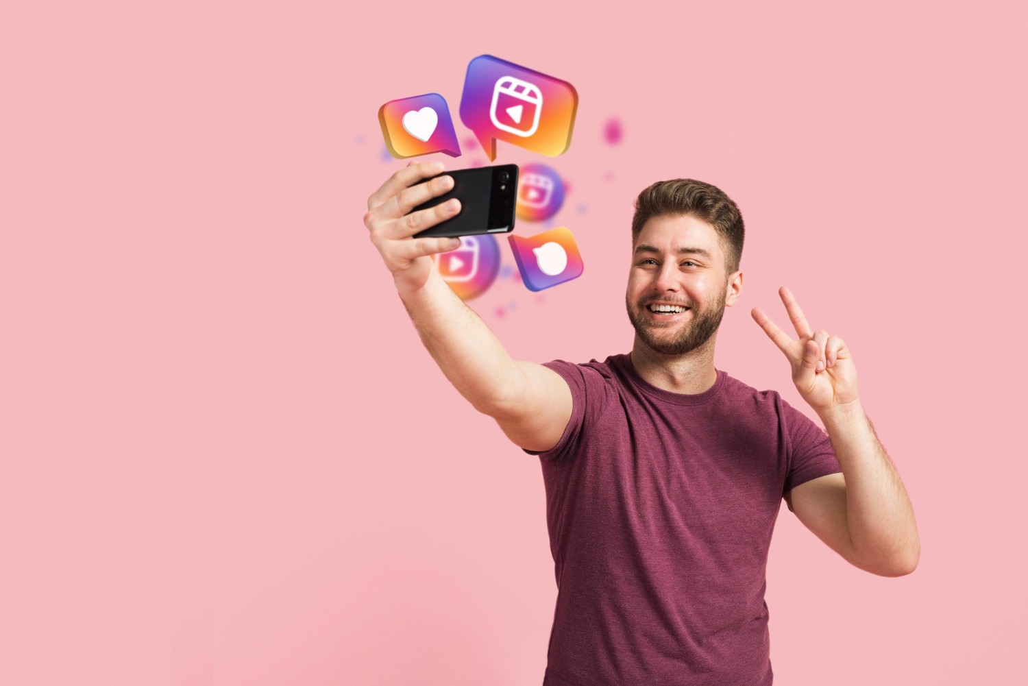  A man raises his phone, displaying various social media icons, symbolizing digital connectivity and communication.