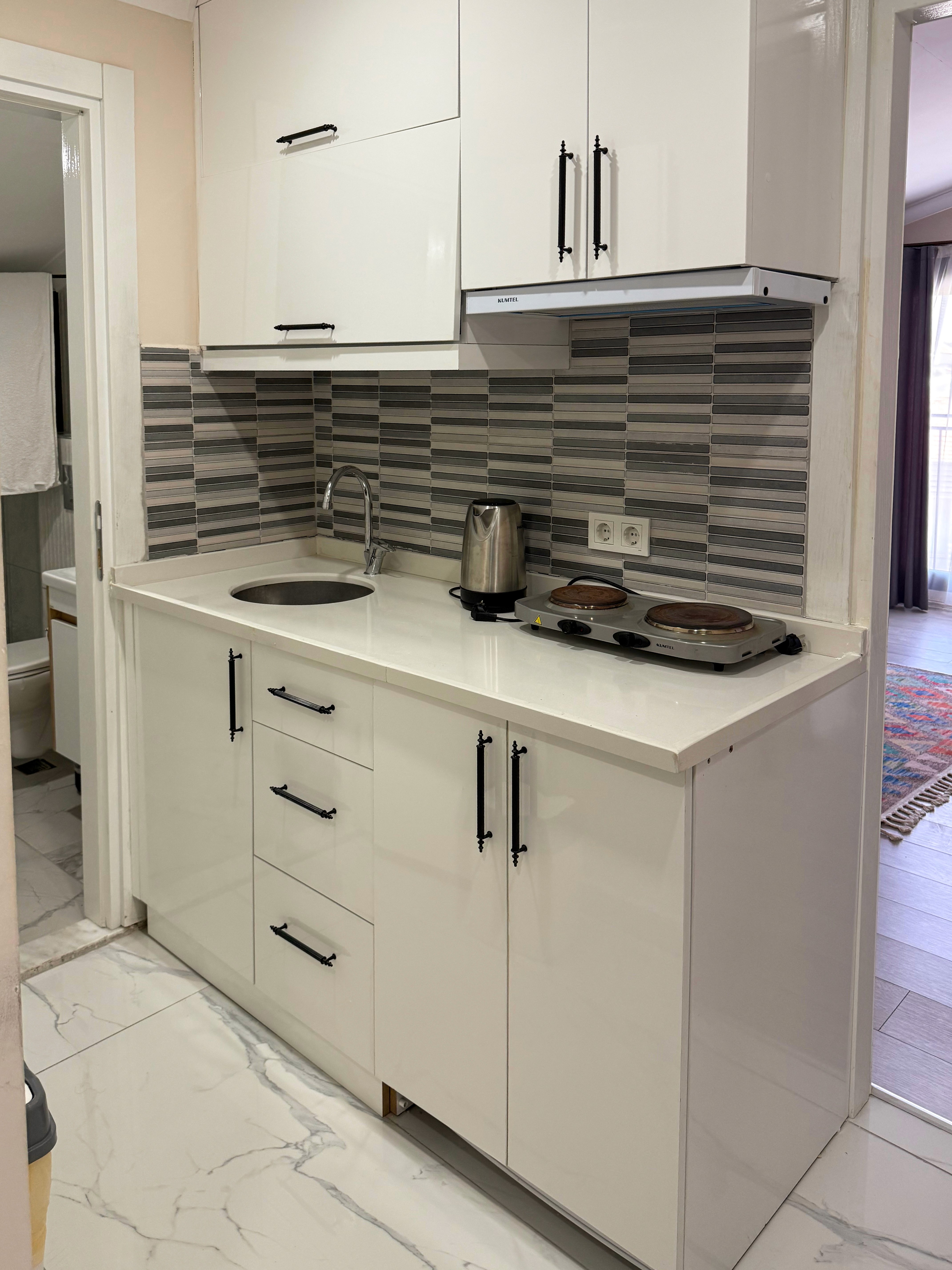 Fully equipped kitchen in 1 bedroom apartment at Zen Garden Suites Side Antalya