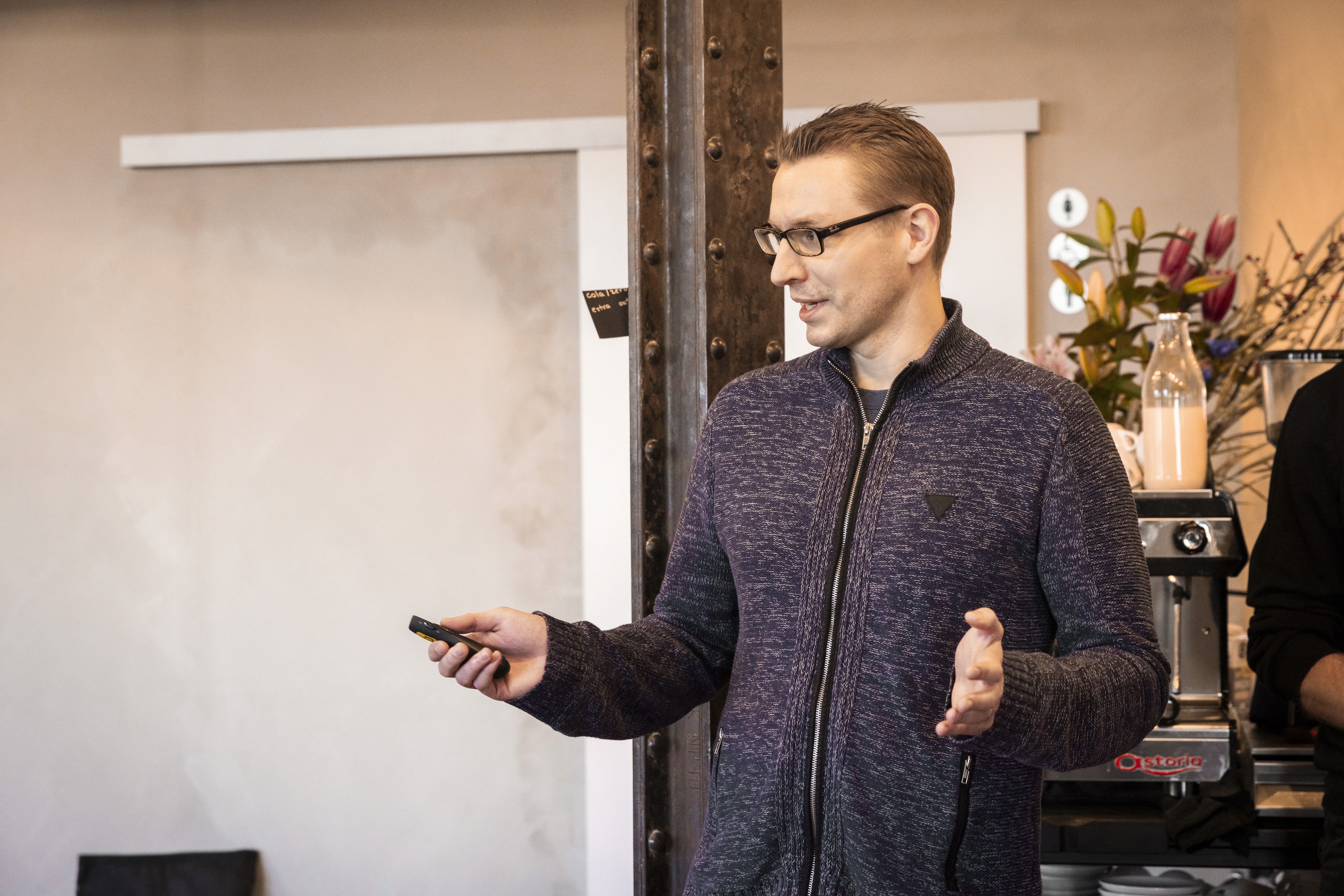 man in blue dress shirt and woman in black long sleeve shirt