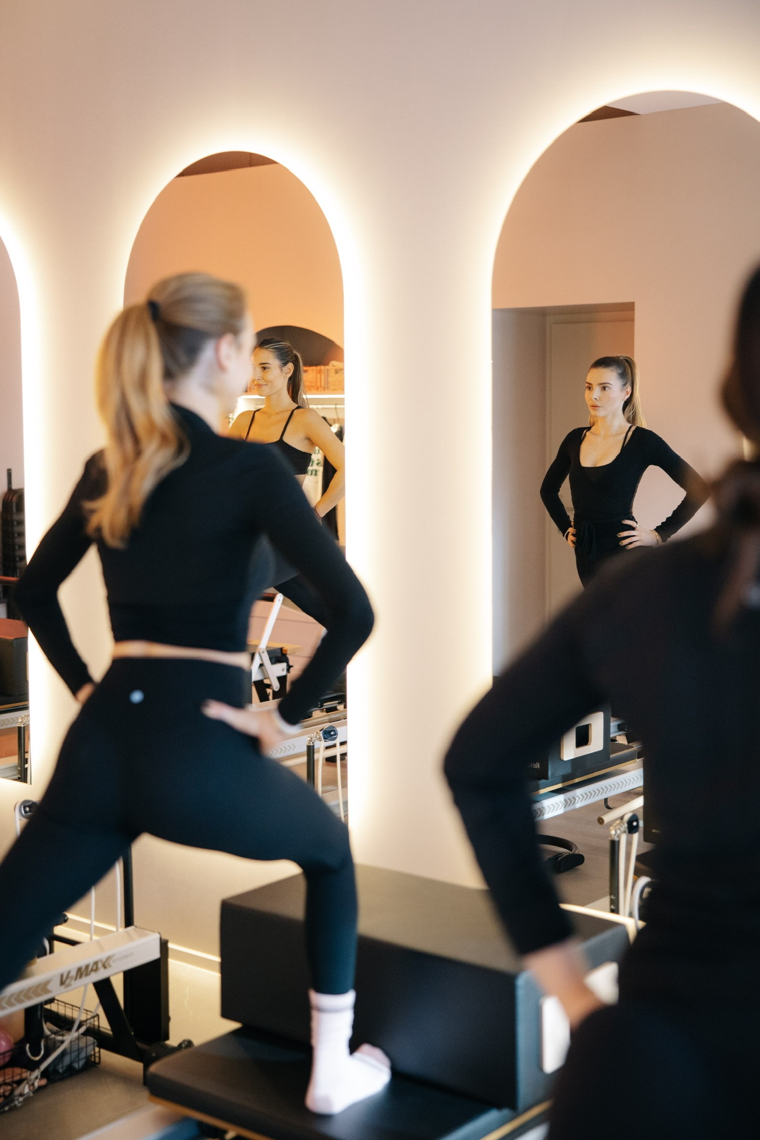 Shirtless man meditating indoors