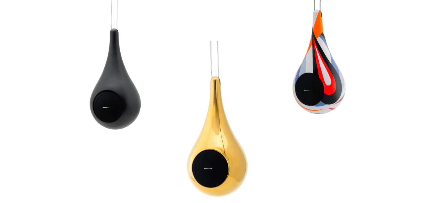 Black smart home device with screen showing time and temp