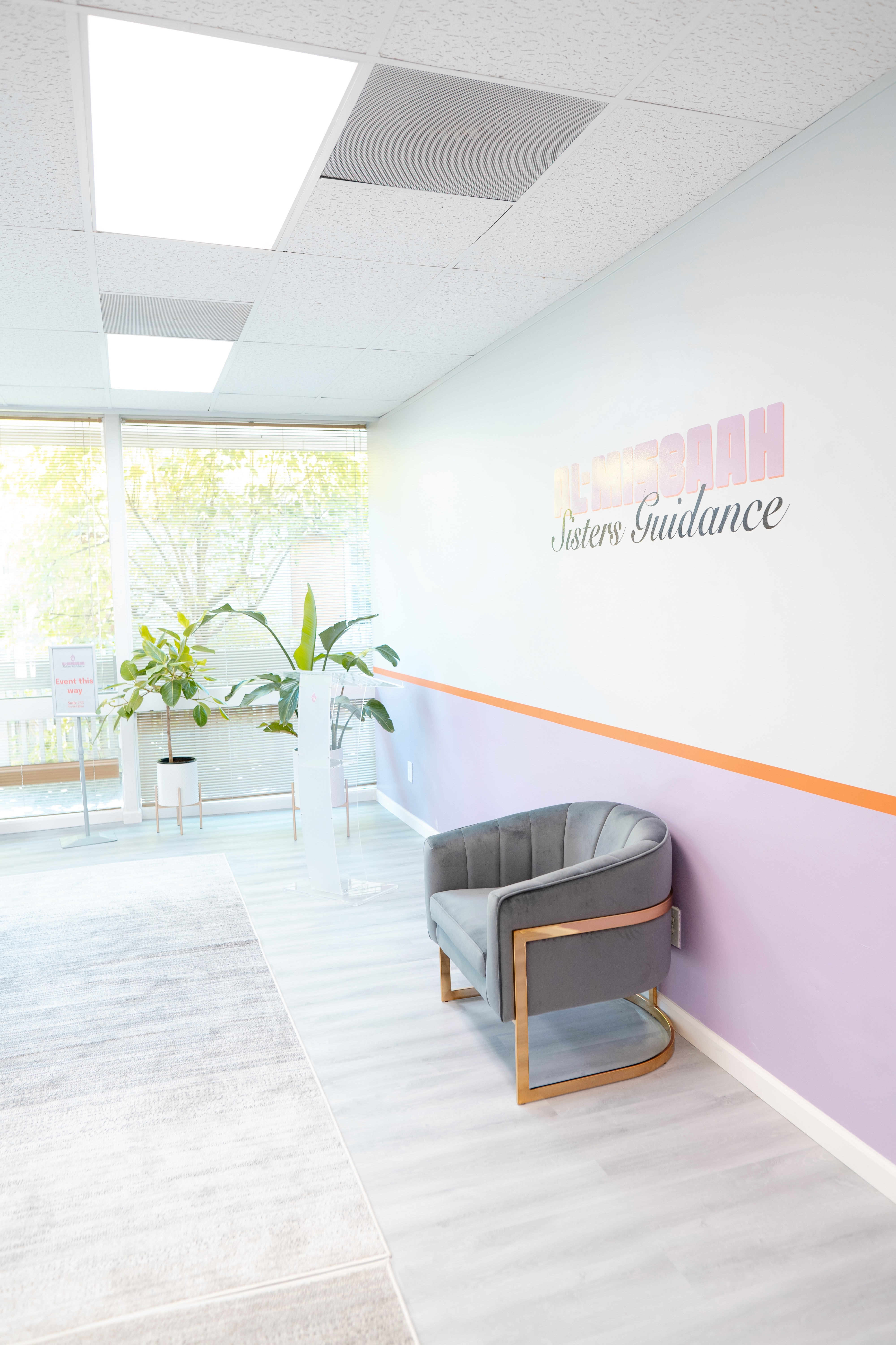 Snow-covered mountain peak illuminated by sunset light