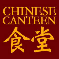 a man standing with black dress