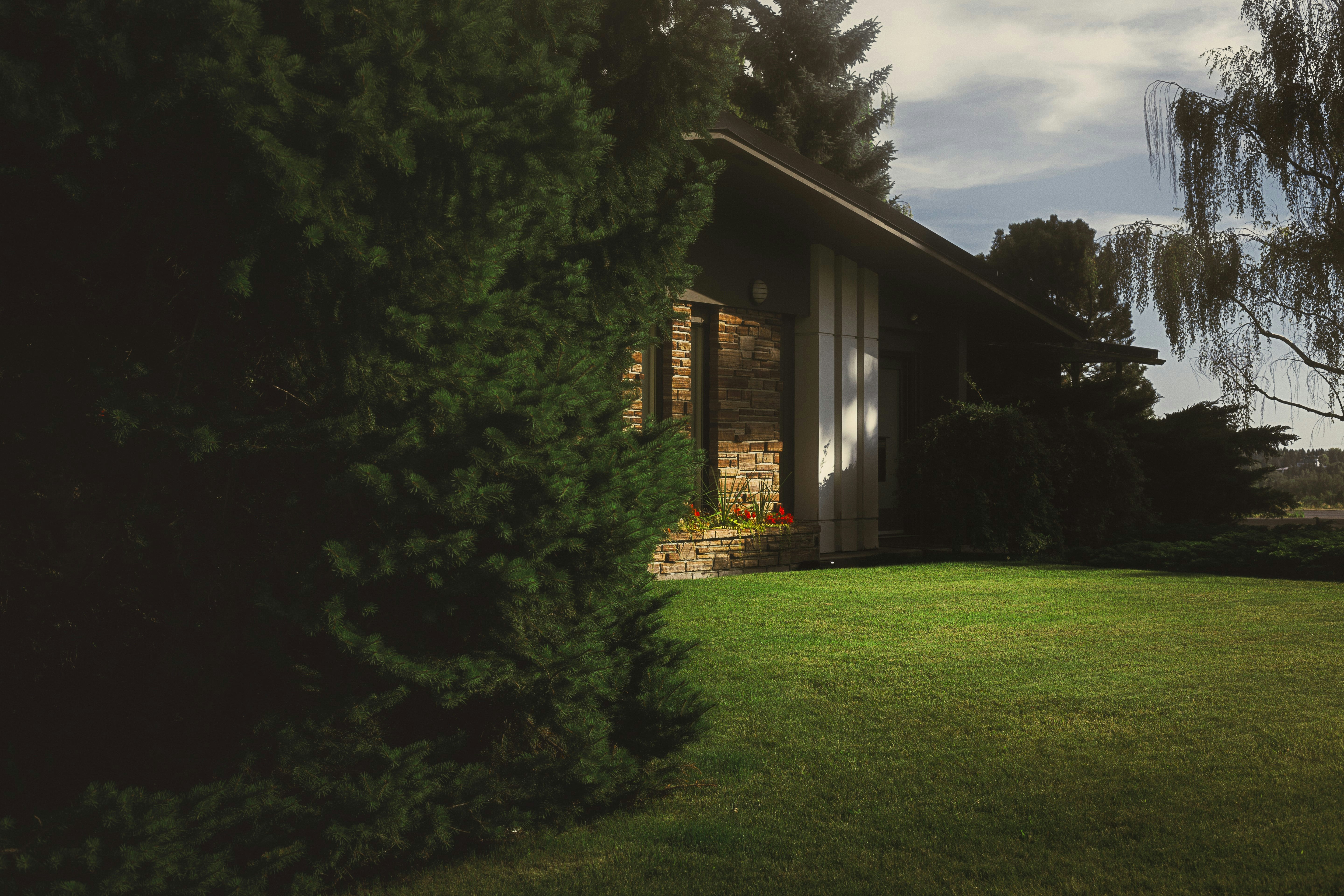 Ambient lighting of a lawn in front of an older home