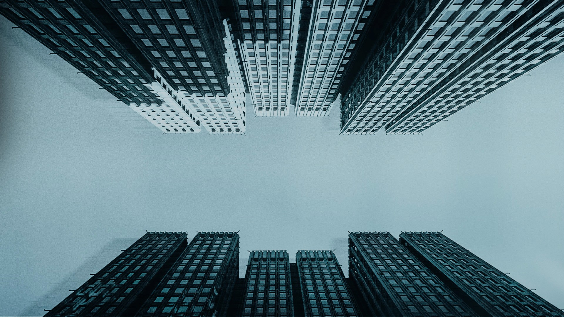 Black cosmetic product bottle against a dark background