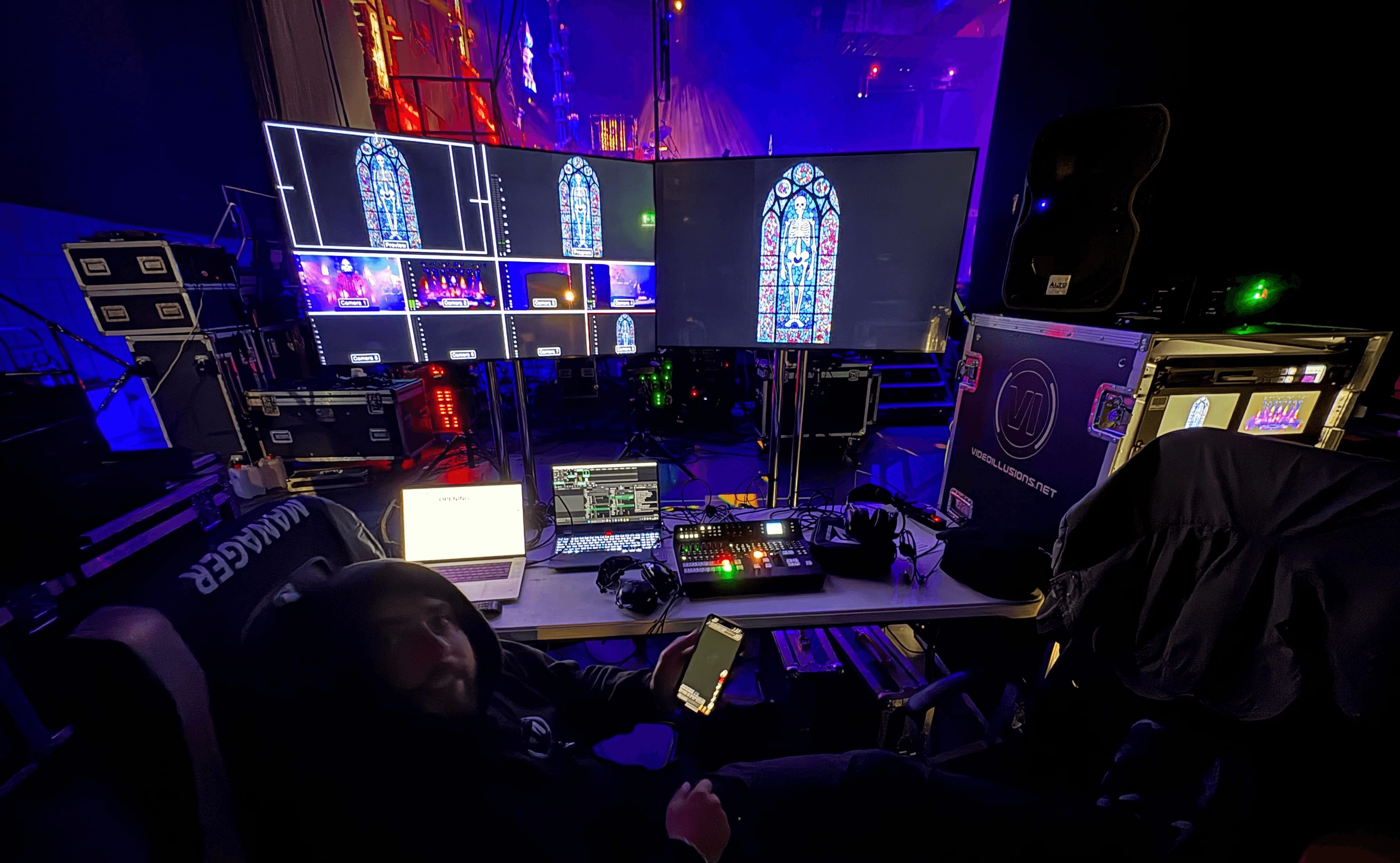 Filming a concert with colorful stage lights