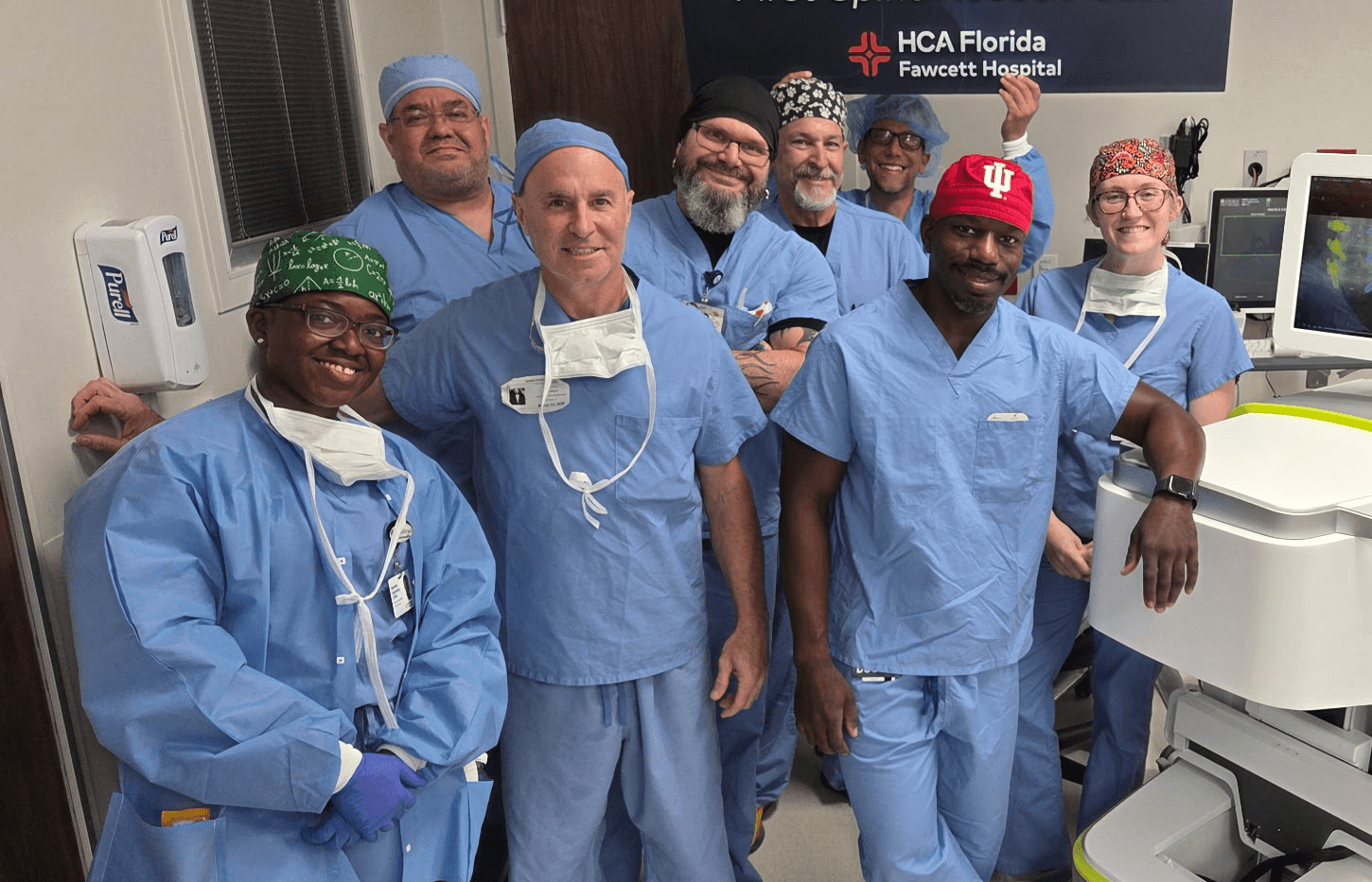 Advanced Orthopedic Center medical team celebrating first robotic spine surgery