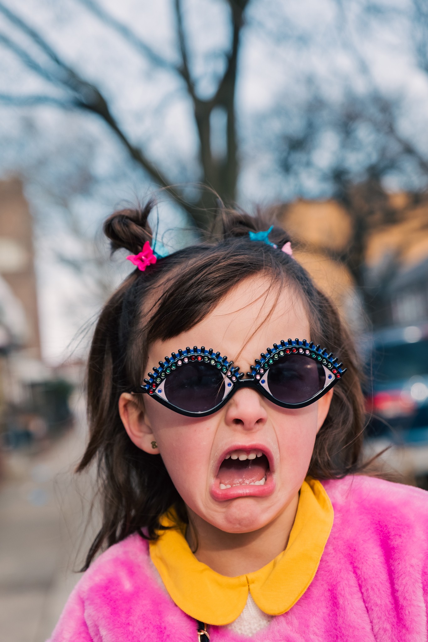 katt-jones-sunglasses-portrait-fun-young-girl-pink-fur-coat-nyc