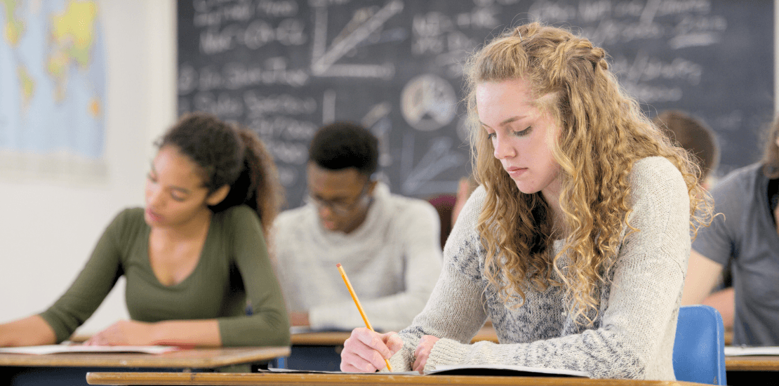 Teenager taking a test