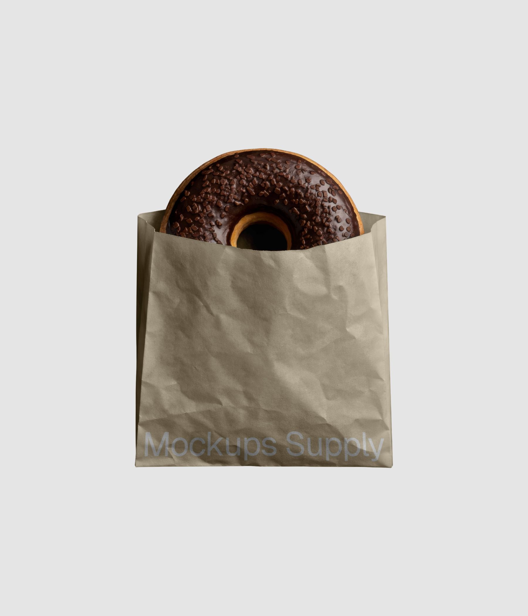 Beige paper bag donut mockup featuring chocolate donut with customizable packaging design on dark surface for pastry shop branding