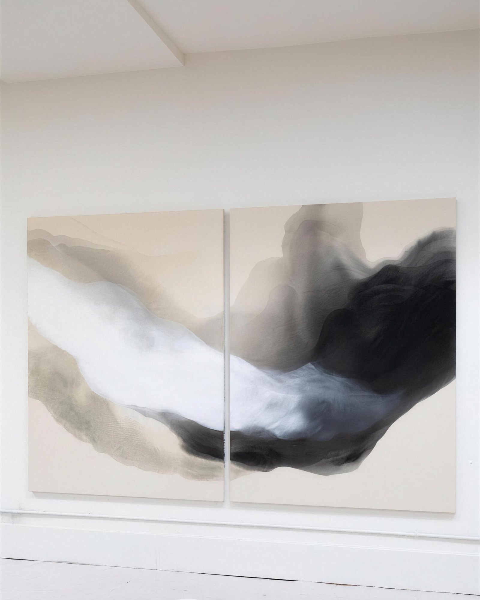abstract black and white painting on a plaster wall
