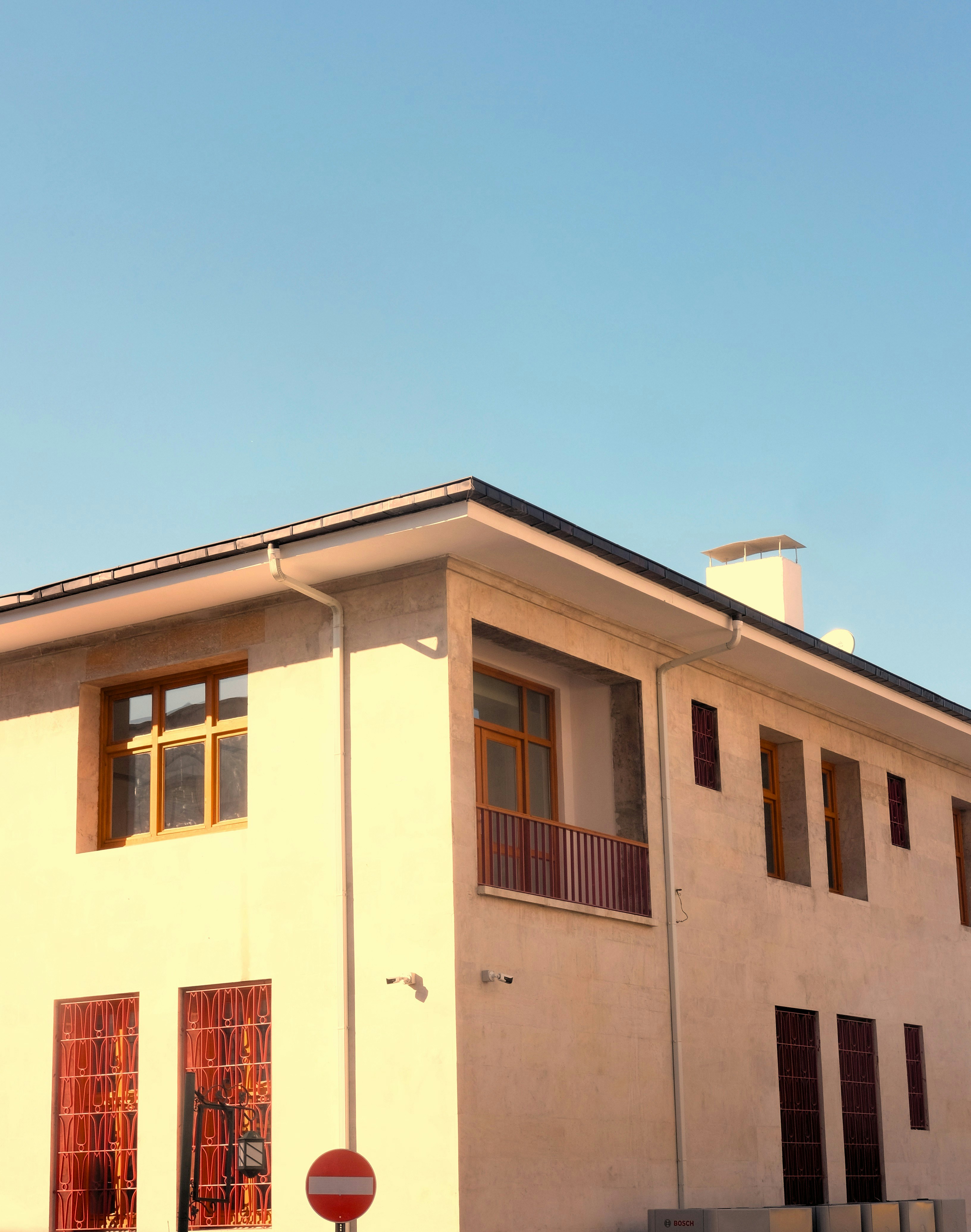 Modern building with large windows against clear sky