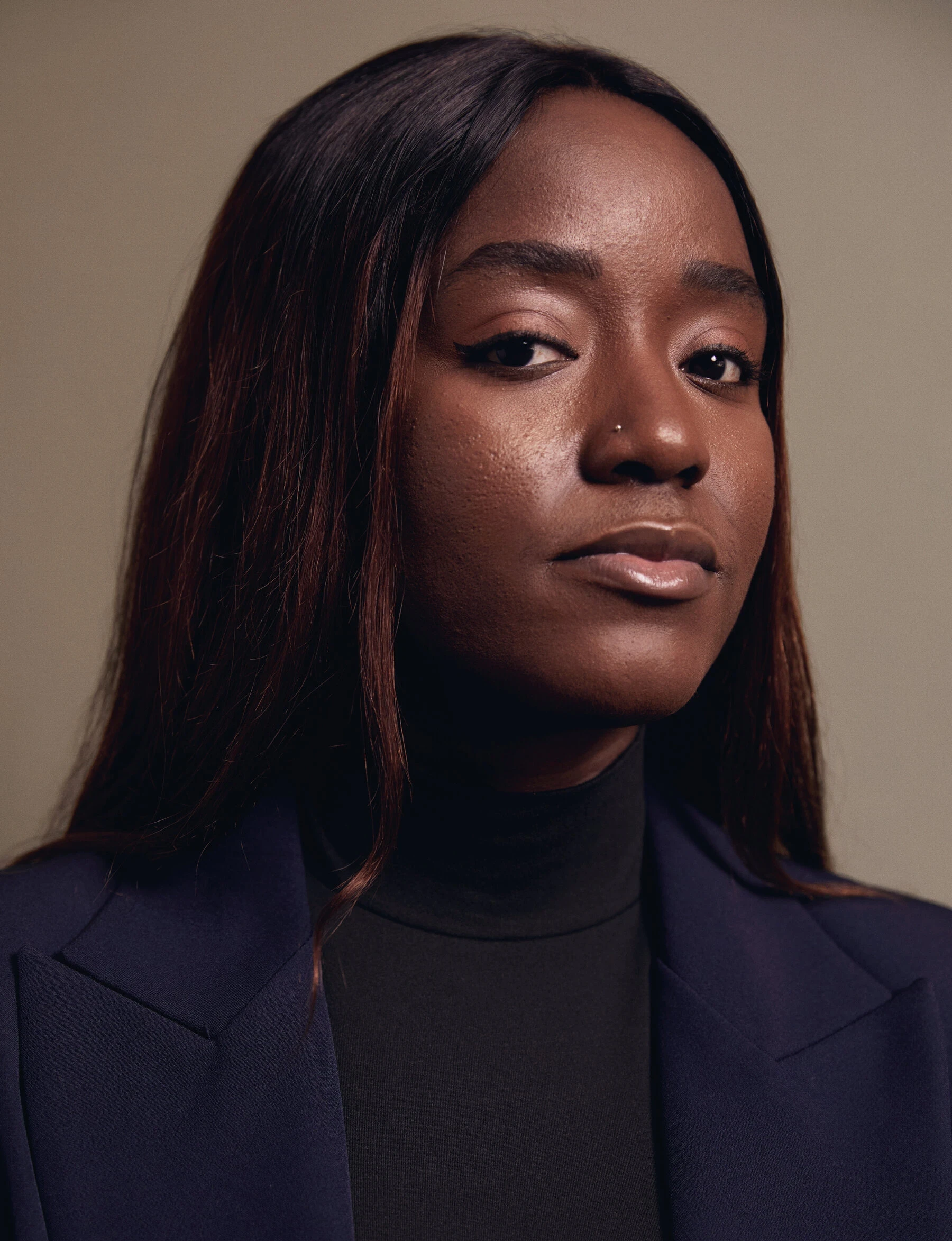 woman in white crew neck shirt smiling