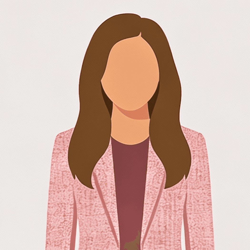 Amy standing by a window in an office