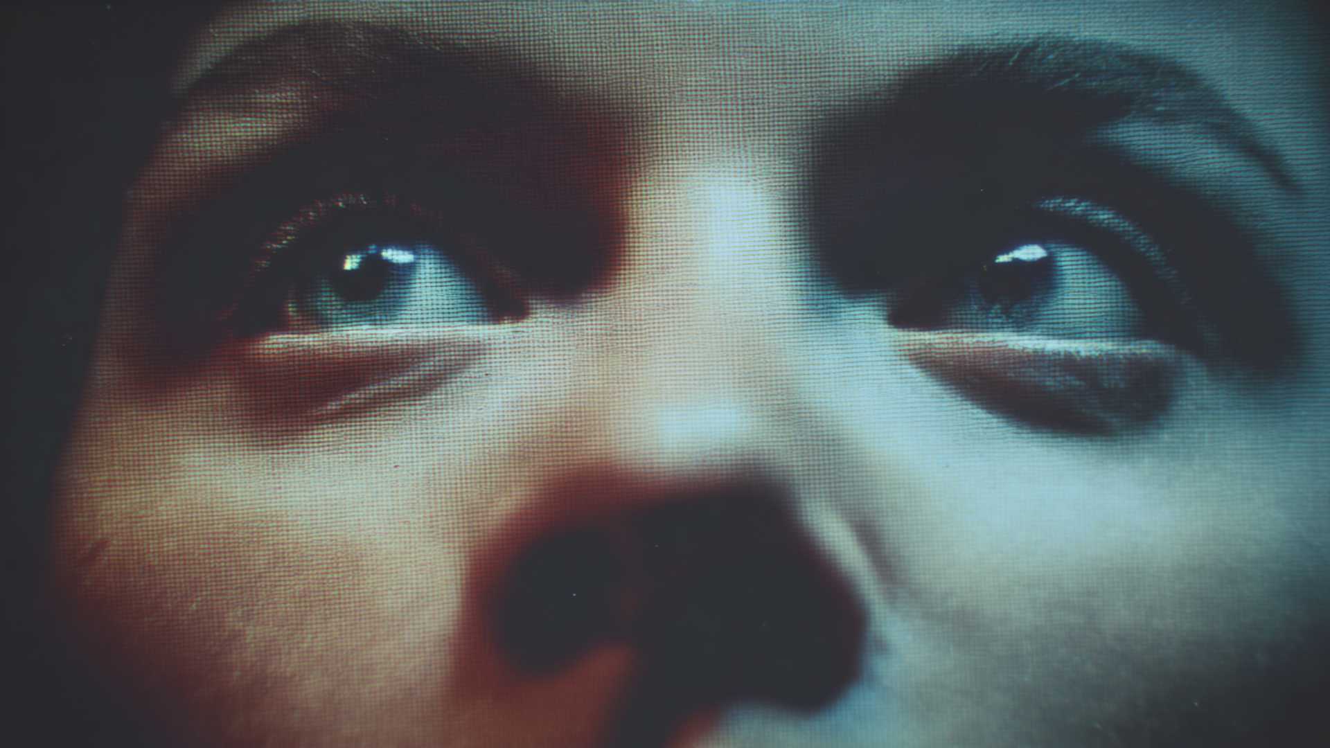 A cinematic close-up of a digital human face showing subtle, directed emotion, illustrating the shift from photorealism to performance.