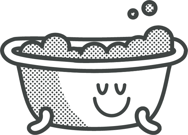 A cartoonish bath with a smiling face, filled with bubbles. 