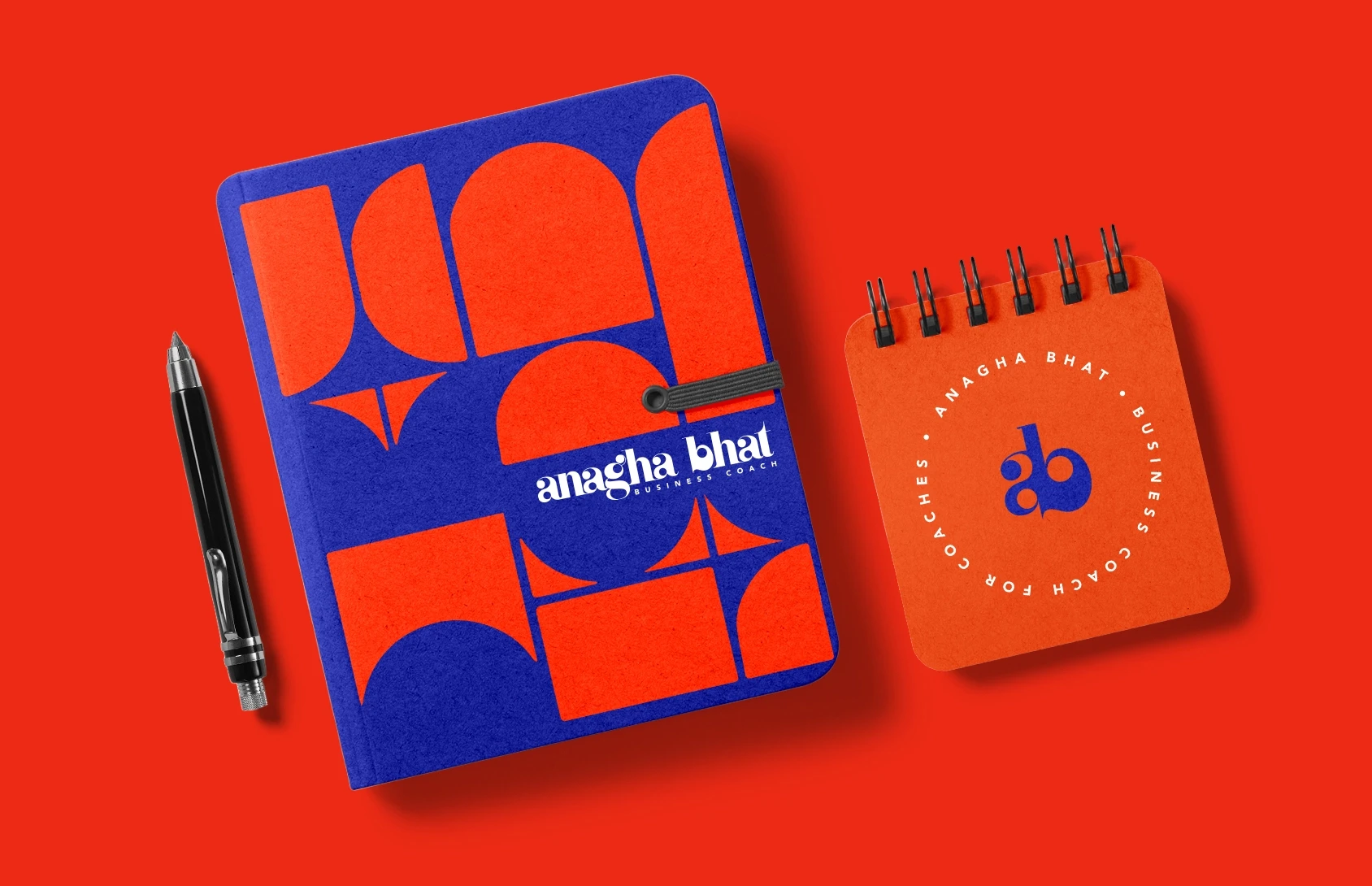 Brand stationery design for Anagha Bhat featuring notebook and notepad with custom typography