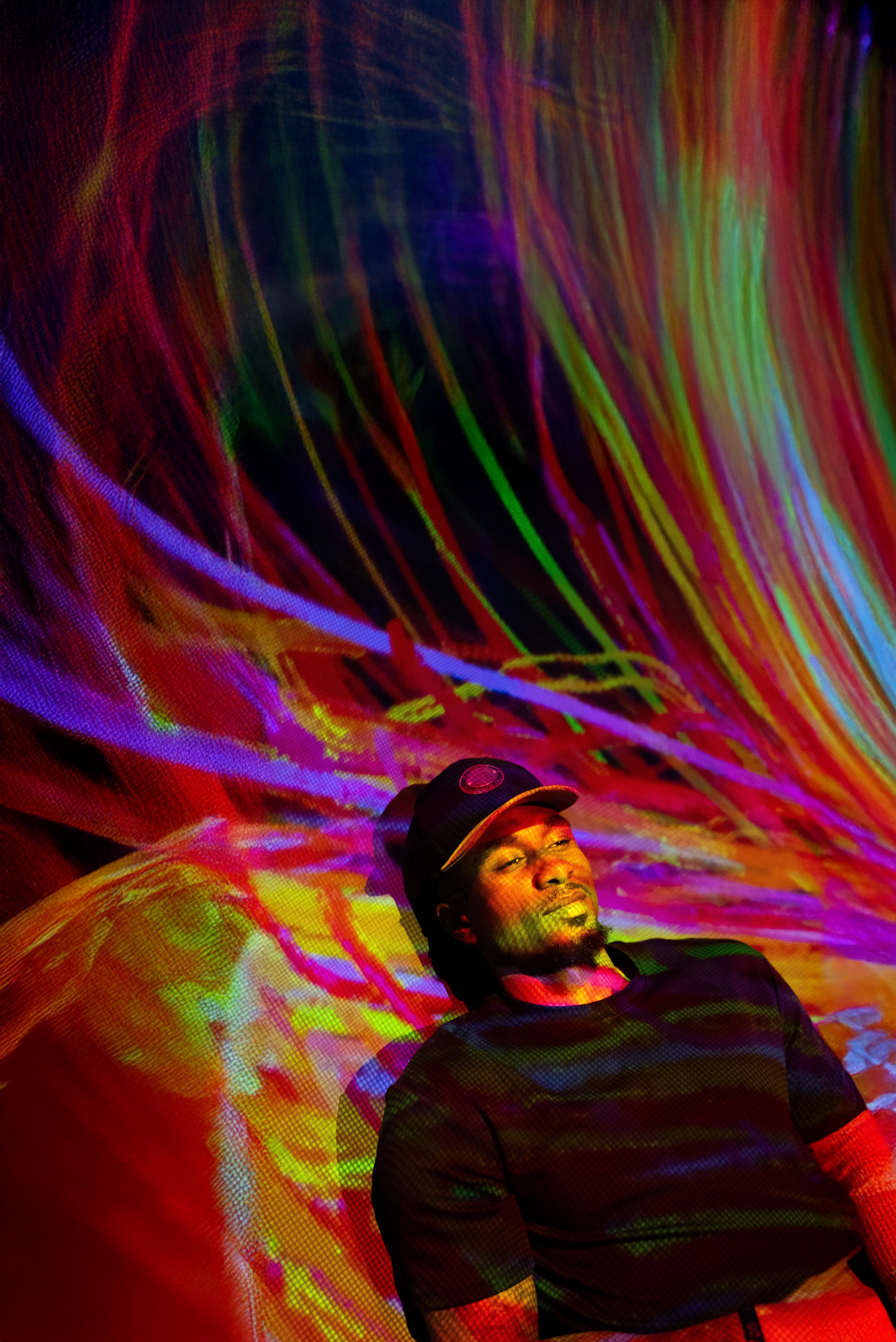 Woman hugging Shiba Inu dog, both looking at camera