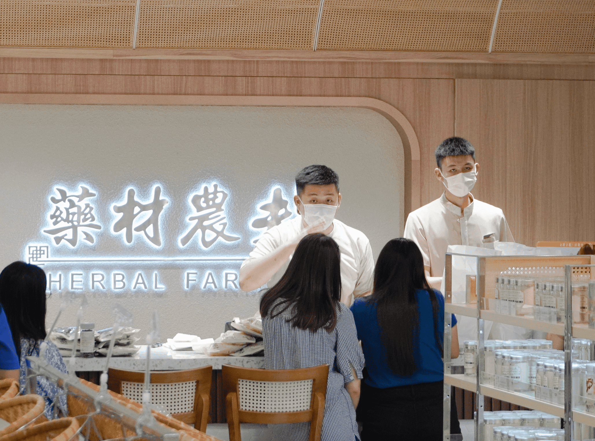 herbal farmer employees serving customers at the retail shop