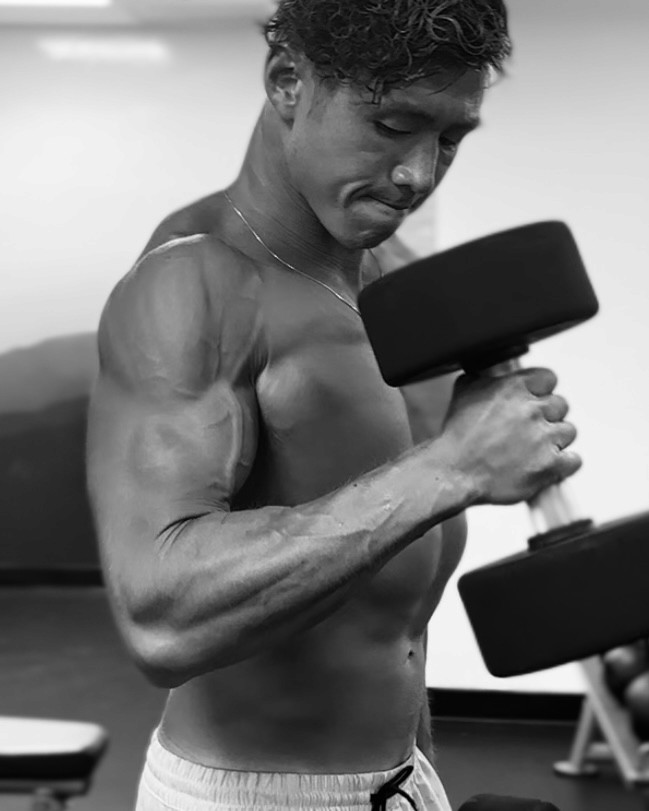 Rachel Stone standing with ABS and hands in her pockets