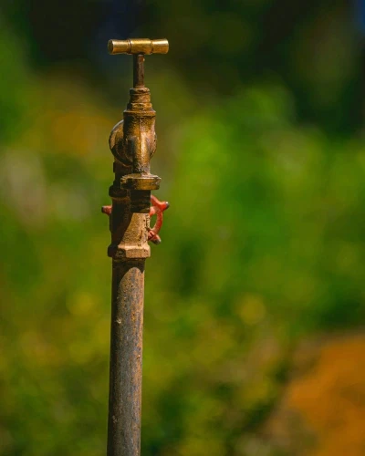 Repairing a leaking corroded copper pipe in a residential plumbing system