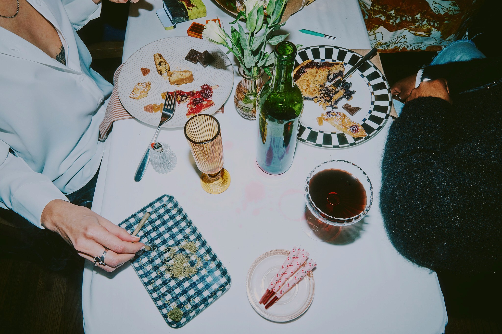 American flag flying against a cloudy sky