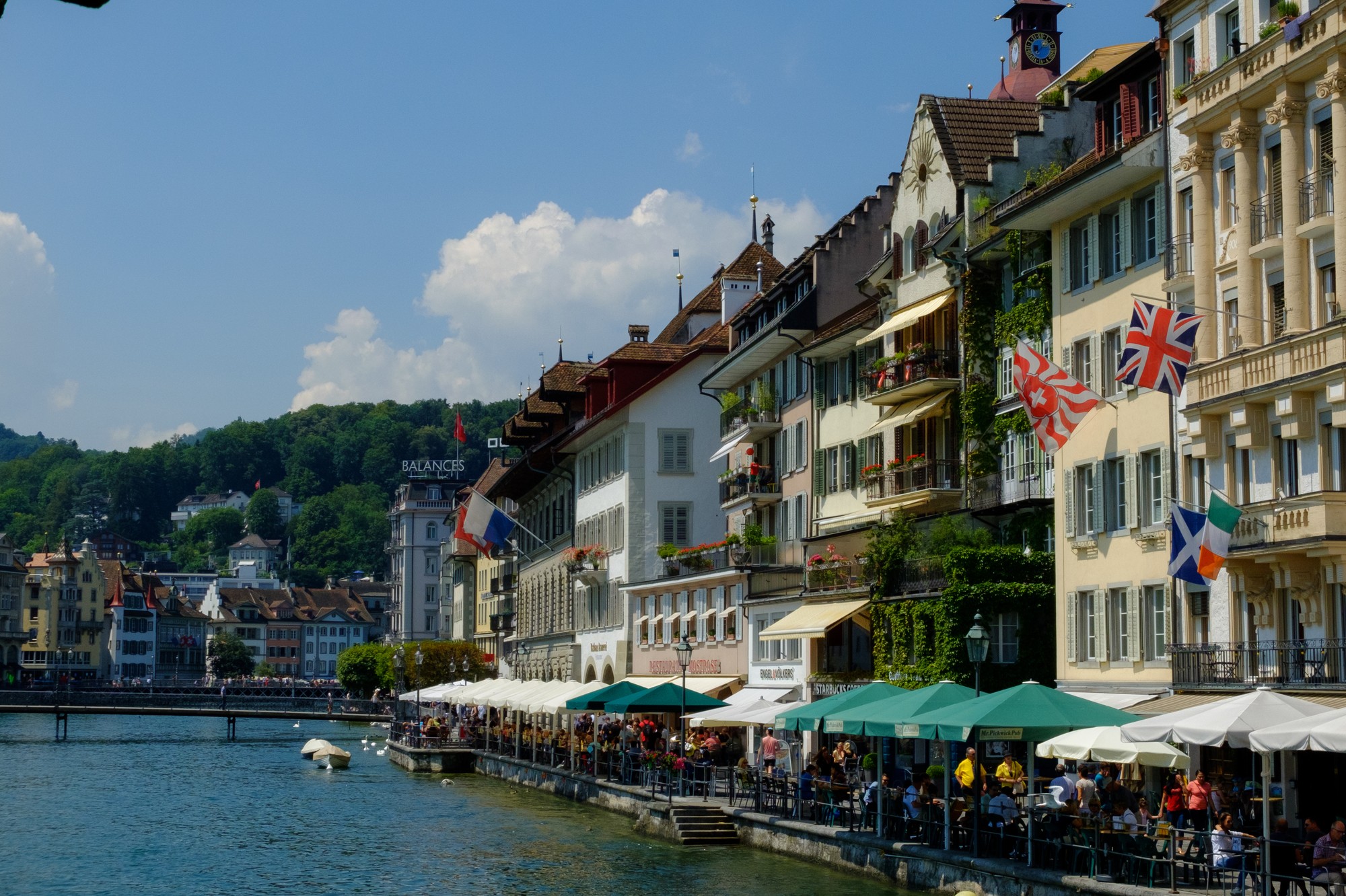 A wooden walkway leading to a body of water