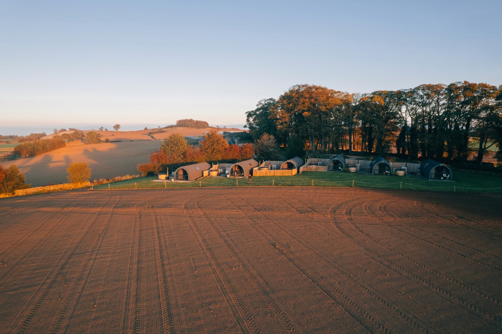 A drone shot of the pods at golden hour. 