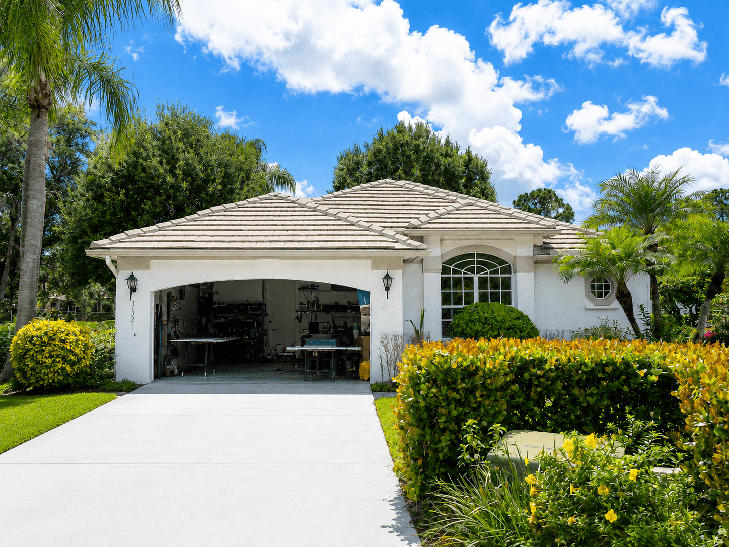 1994 New Roof Construction in Hawks View, PGA Village, Port St Lucie with Entegra Flat Broomswept Tile in Natural Gray