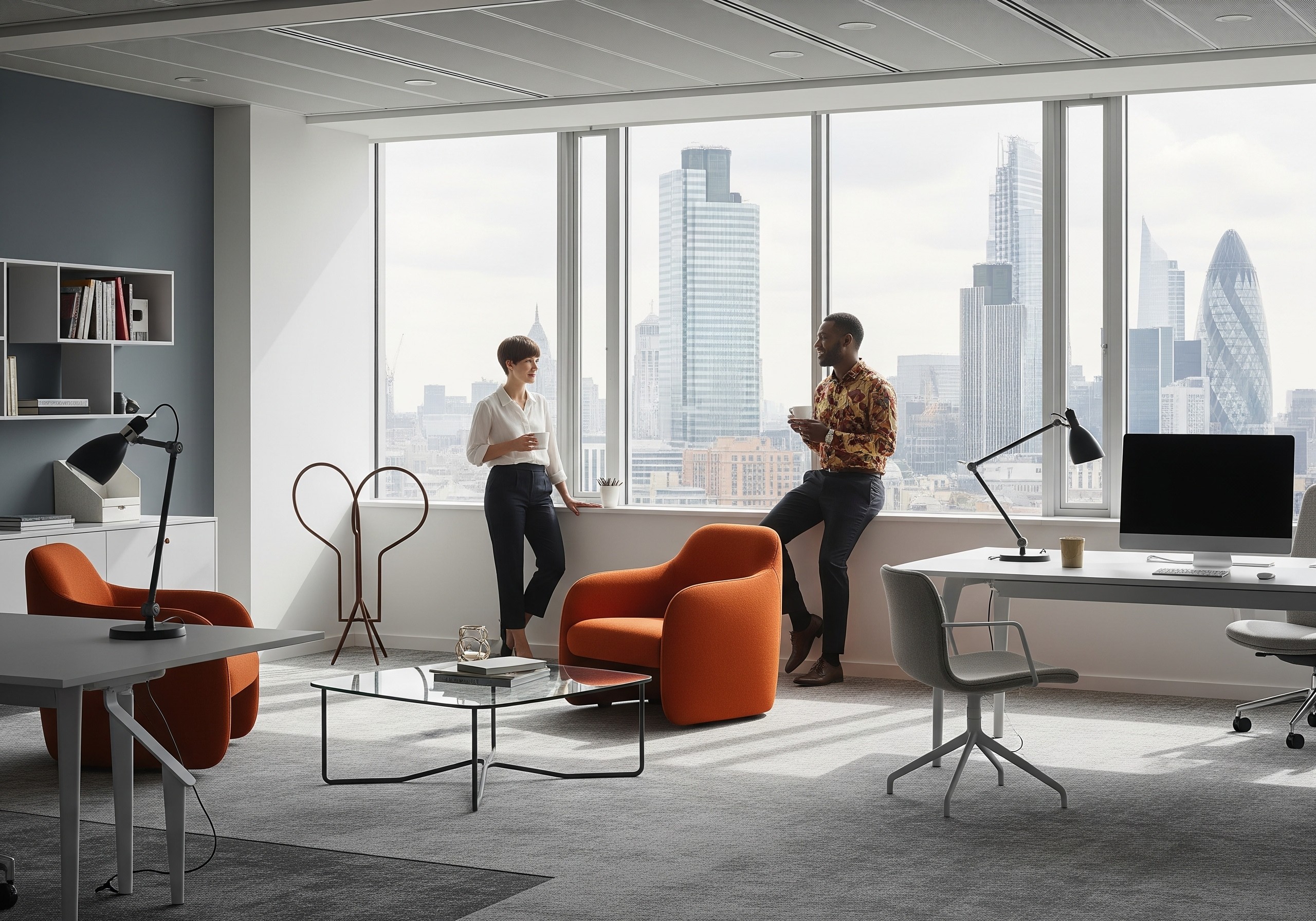Professionals discussing office design in a modern commercial space with views of the London skyline.