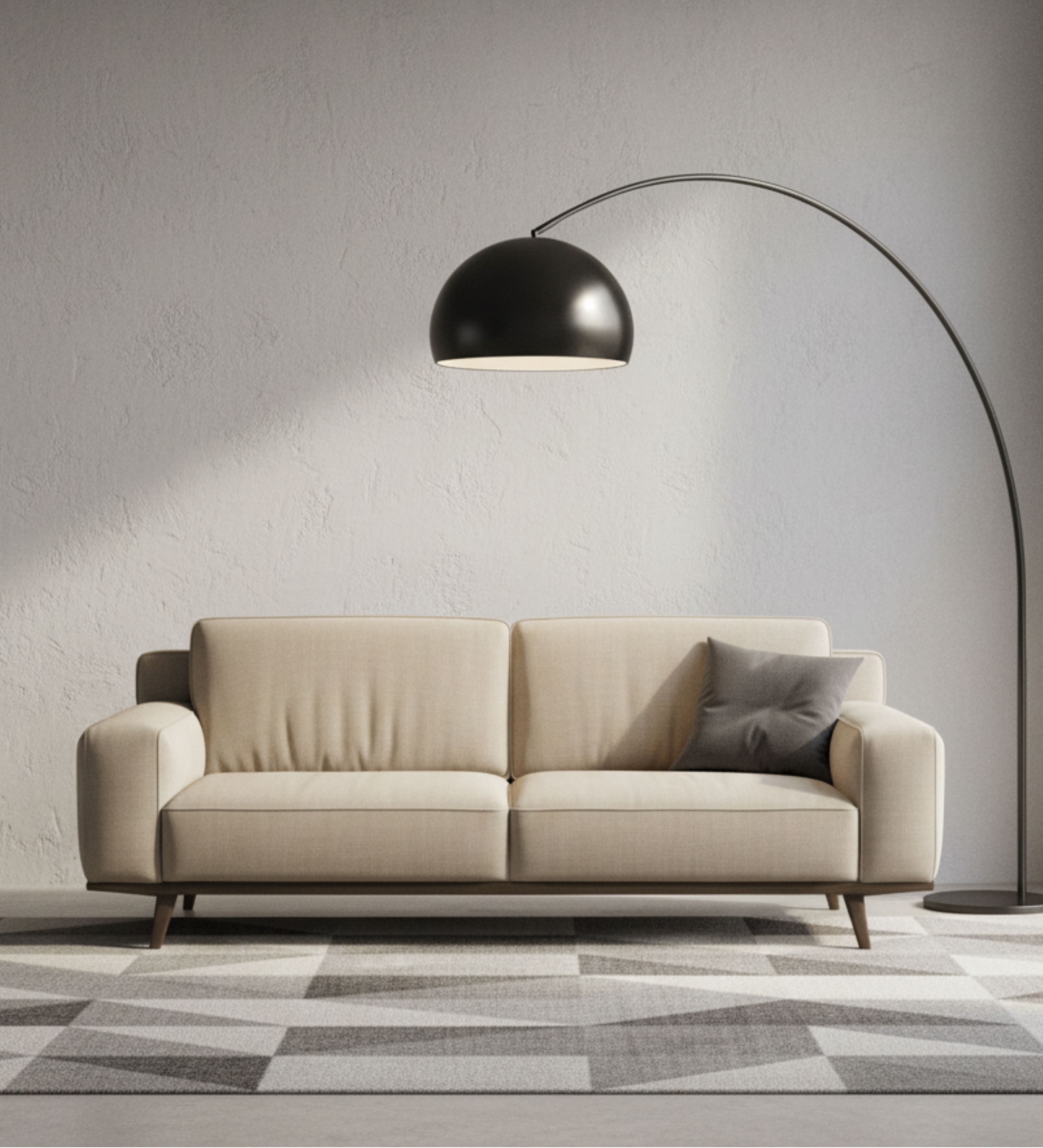 Three‑seater cream upholstered sofa with wide arms and tapered wooden legs