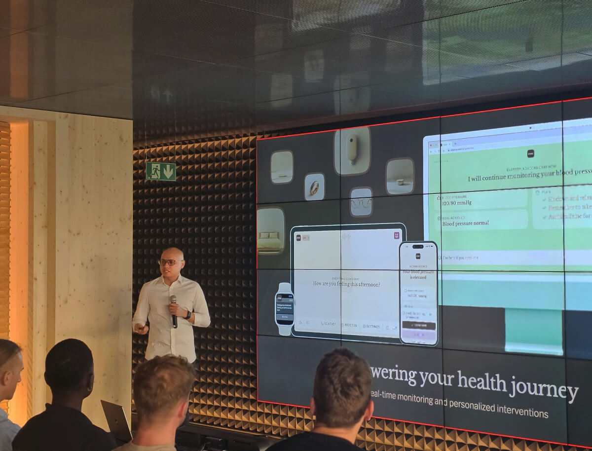 Photo of Keith presenting Esse to a crowd