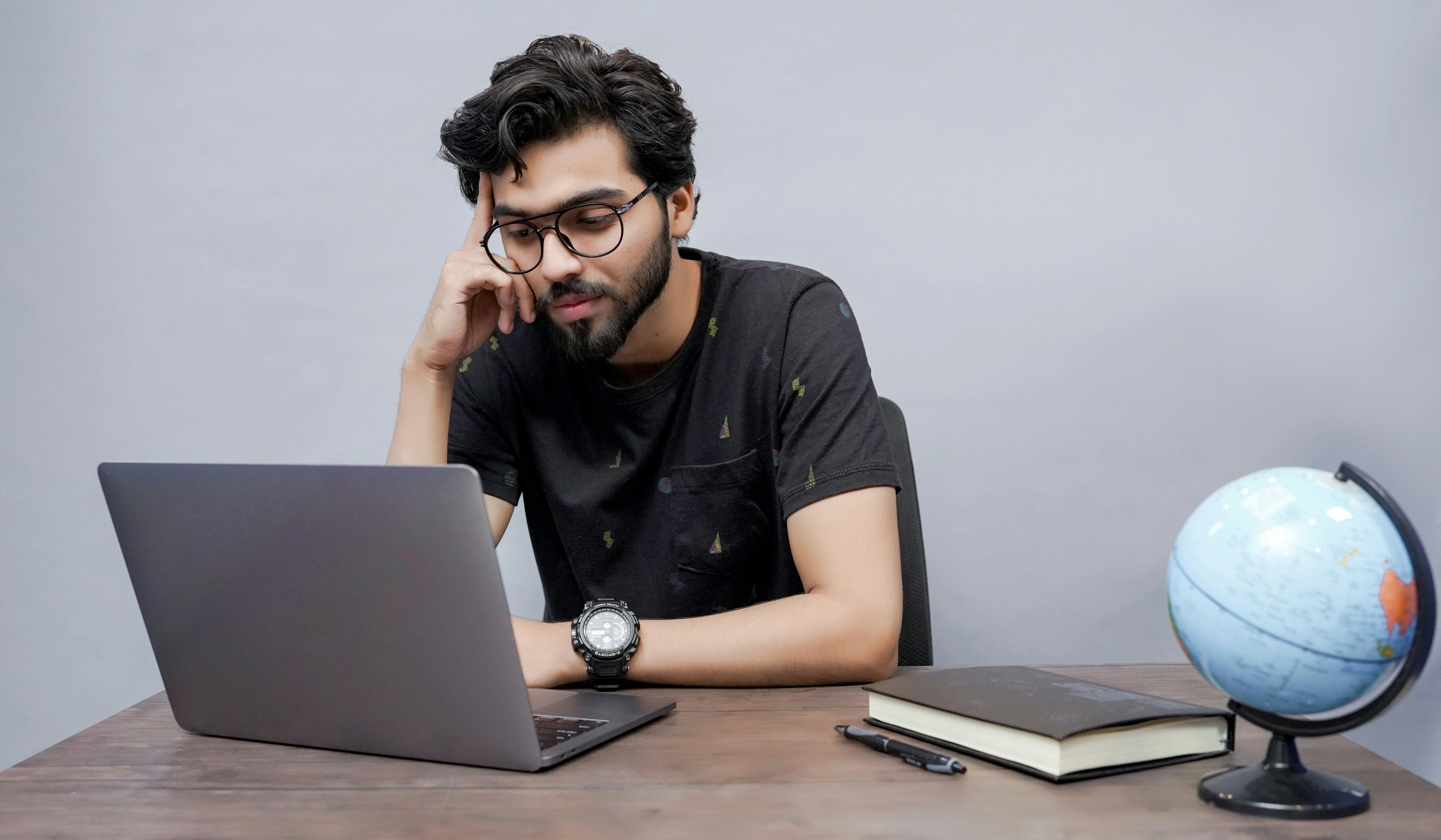 person infront of laptop - Fan Engagement