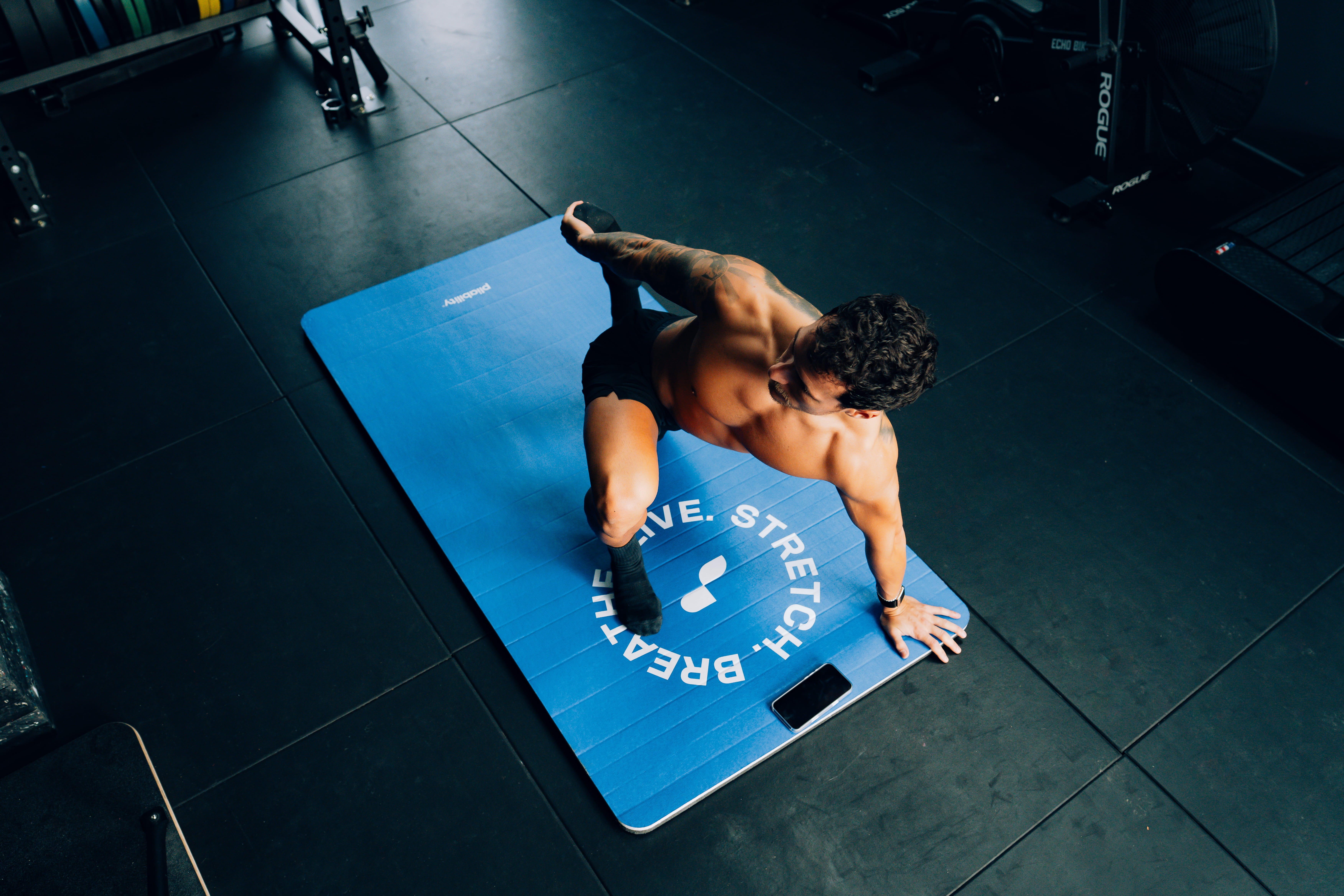 person stretching -  IV Therapy for Athletic Performance and Recovery