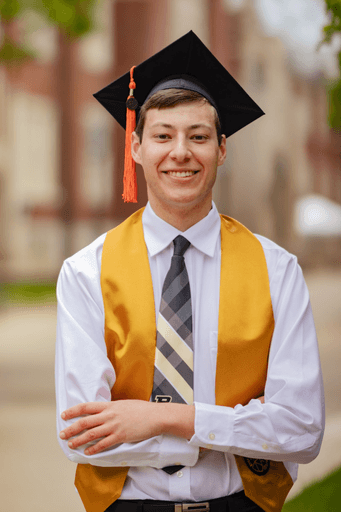 young man in graduation cap and stole