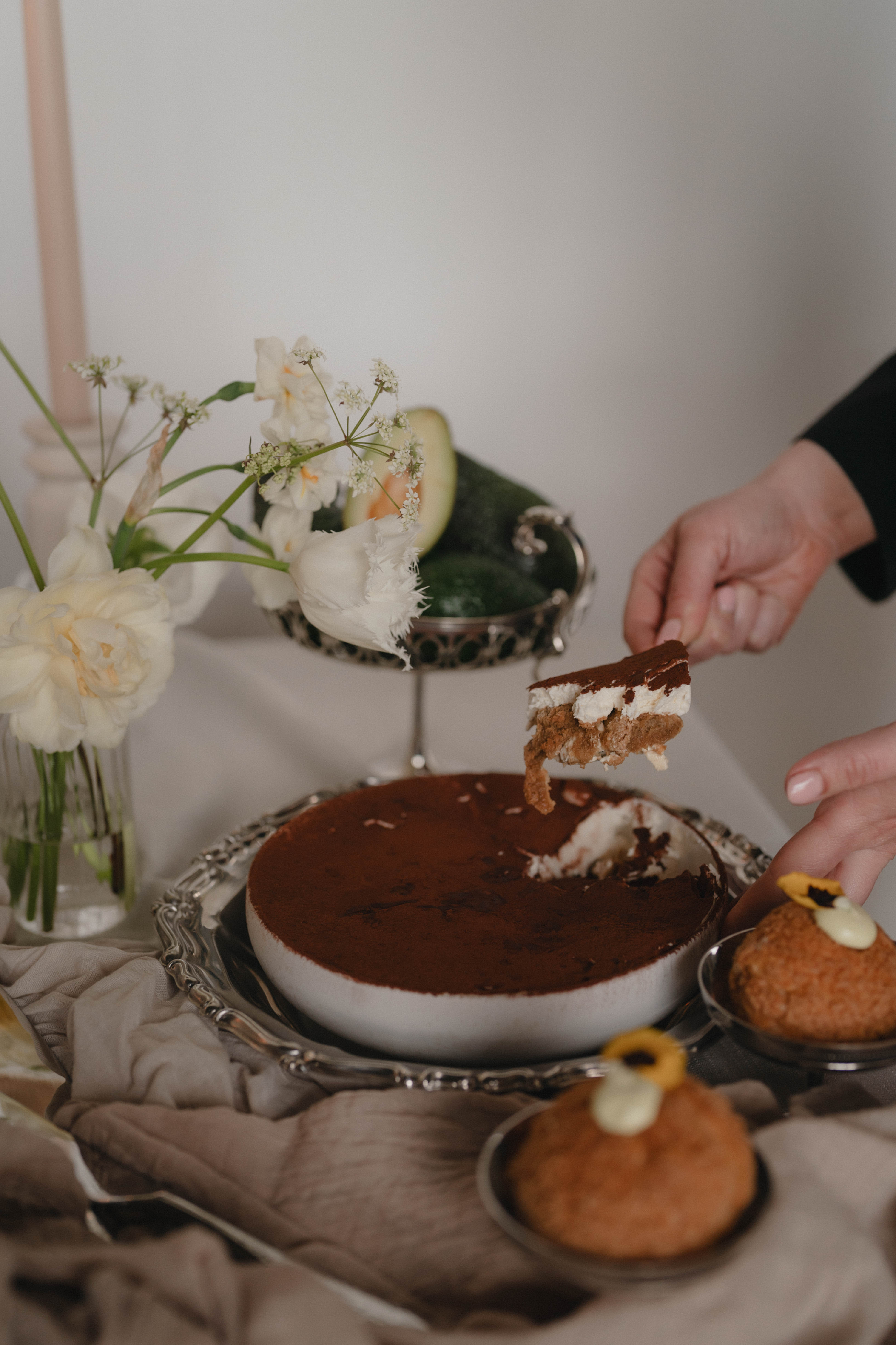 Team CBC. Some wear chef whites and black pants. Others are in black tops and pants.