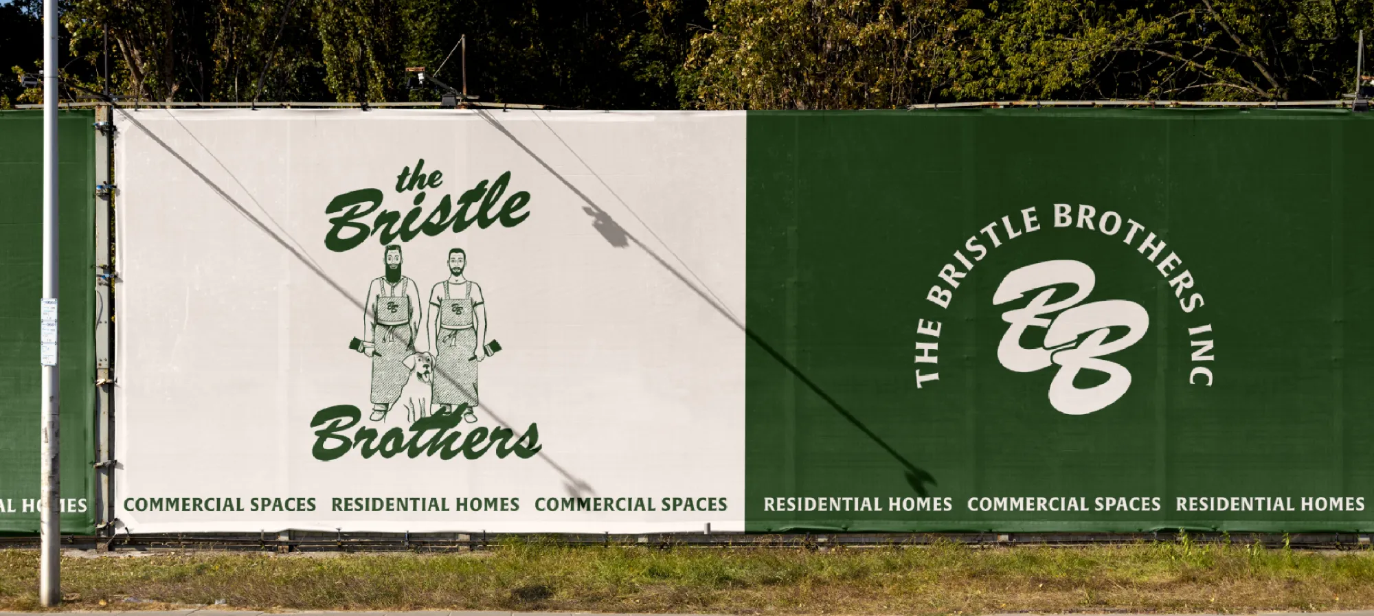 Bristle Brothers fence signage with an illustrated retro logo of the owners on a cream background and a Monogram on a green background.