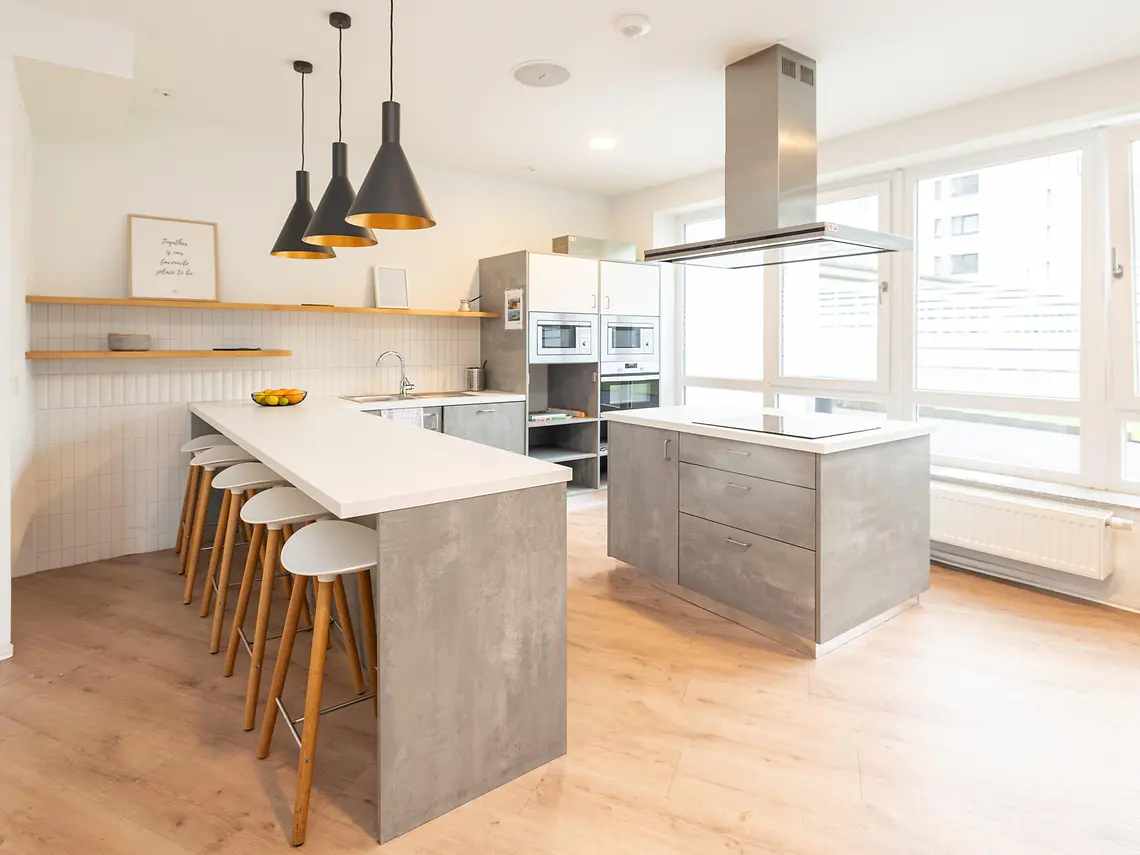 Communal kitchen in student accommodation in Darmstadt with modern cooking and dining facilities