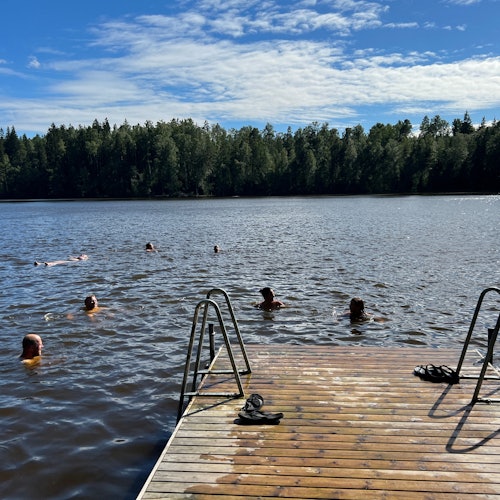 Swimming during a break between sauna sessions