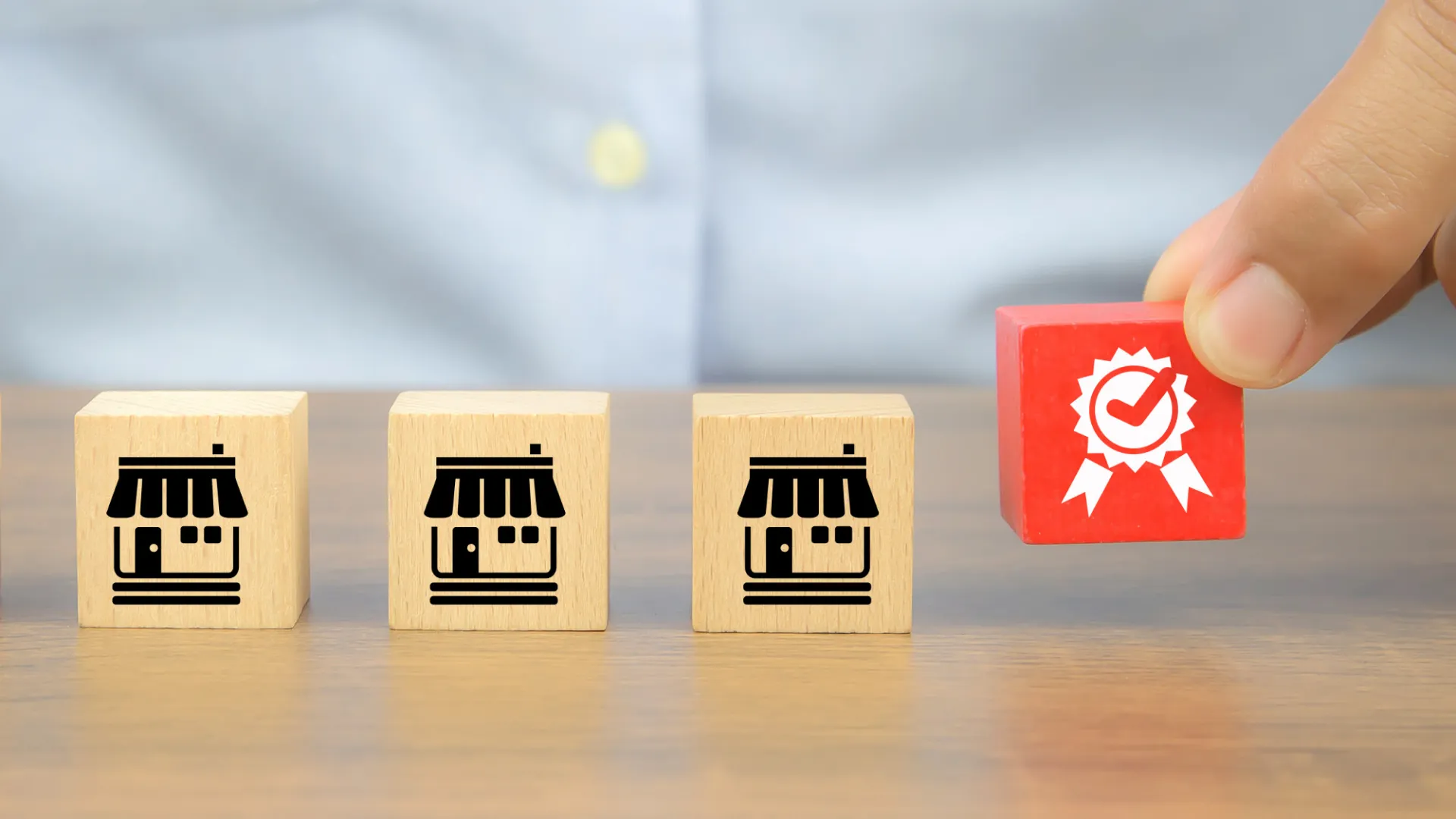 Hand selecting certified approval badge among e-commerce storefronts, representing proper TikTok Shop brand authorization and trademark compliance verification.