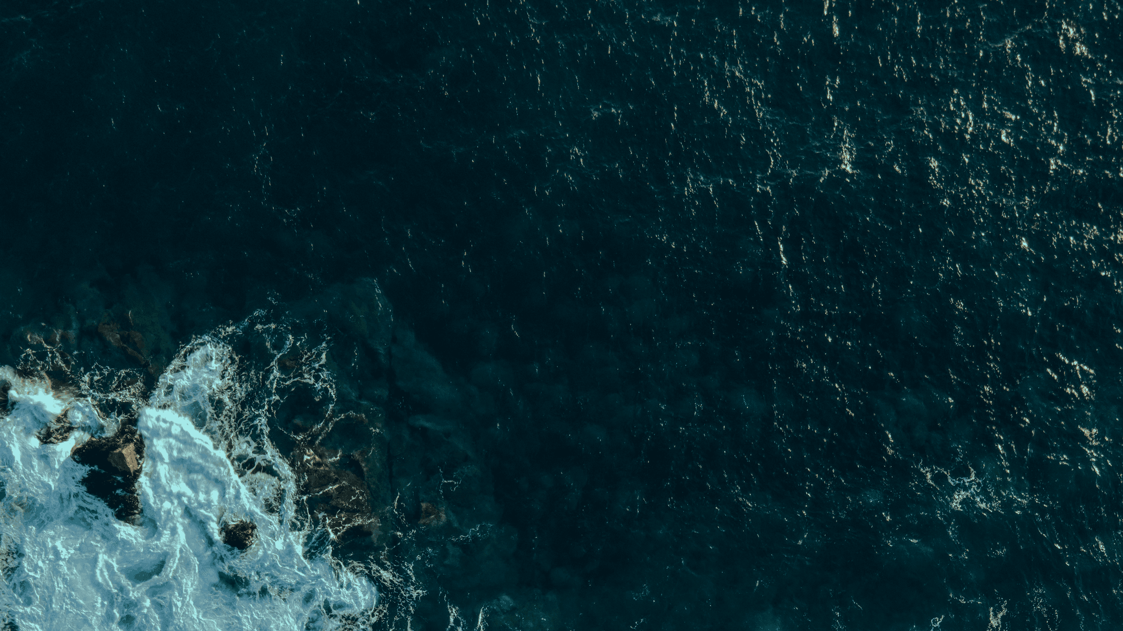 concrete road between mountains