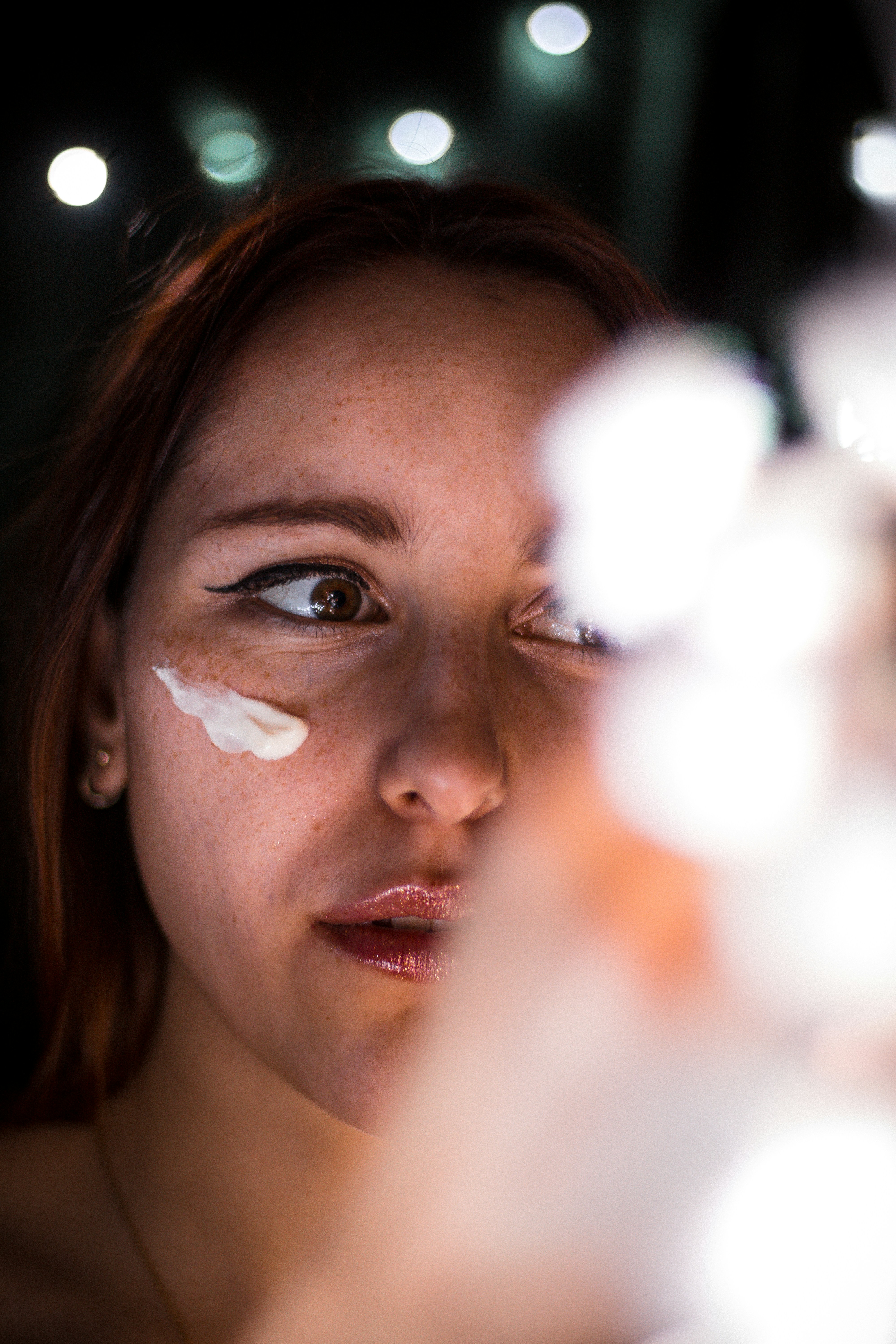 woman with white face paint